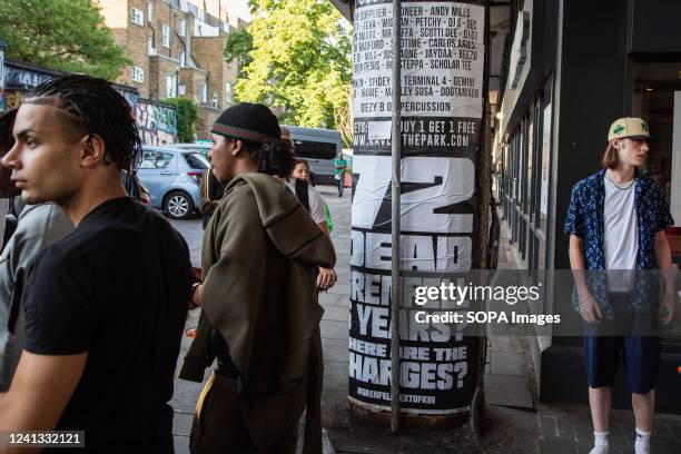 Grenfell fire poster is seen during the silent walk. Grenfell Tower fire survivors and bereaved relatives began a day of remembrance five years on...