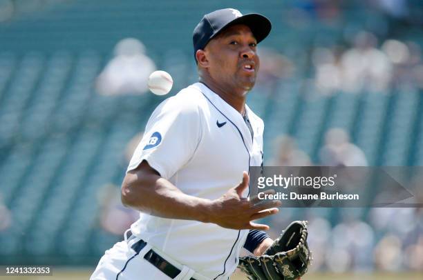 Second baseman Jonathan Schoop of the Detroit Tigers can't make the catch of a foul ball hit by Luis Robert of the Chicago White Sox during the first...