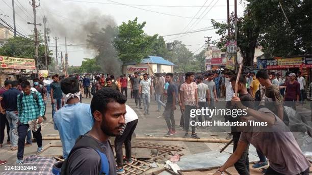 Youth protest at various places against 'Agneepath Scheme' implemented in armed forces on June 15, 2022 in Muzaffarpur, India.