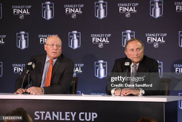 Deputy Commissioner Bill Daly and NHL Commissioner Gary Bettman speak during a press conference before Game One of the 2022 Stanley Cup Final between...