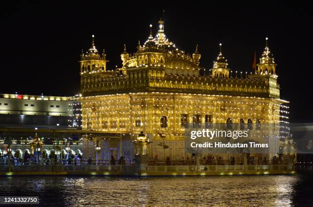 Golden Temple illuminated on the birth anniversary of Guru Hargobind Singh on June 15, 2022 in Amritsar, India.