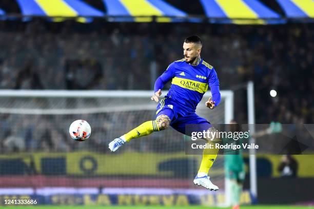 Dario Benedetto of Boca Juniors kicks the ball during a match between Boca Juniors and Tigre as part of Liga Profesional 2022 at Estadio Alberto J....