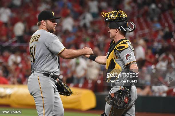 David Bednar and Tyler Heineman of the Pittsburgh Pirates celebrate a 6-4 victory over the St. Louis Cardinals at Busch Stadium on June 15, 2022 in...