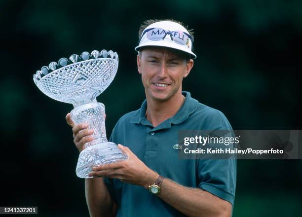 Robert Allenby of Australia celebrates with the trophy after winning the One 2 One British Masters at Collingtree Park Golf Club on August 31, 1996...