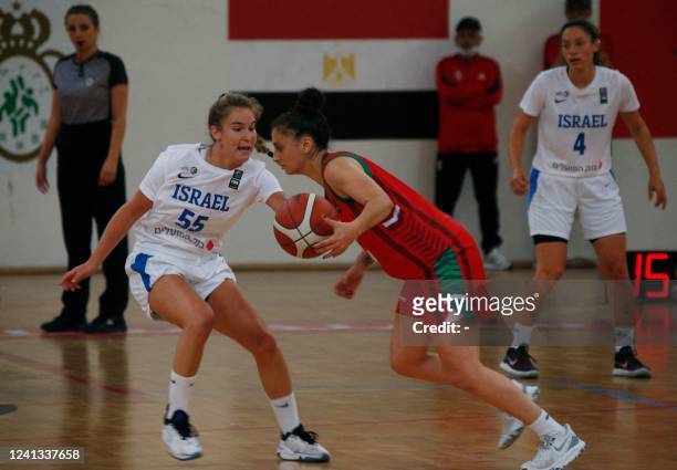 Israel and Morocco's players face off during a friendly women's basketball game in the city of Sale, north of Morocco's capital Rabat on June 15,...