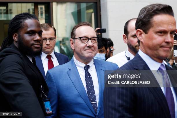 Actor Kevin Spacey leaves the Westminster Magistrates' Court, in London after attending the opening of his trial, on June 16, 2022 in order to face...