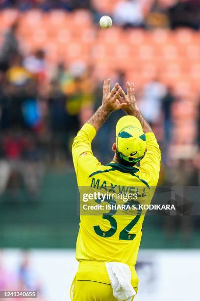 Australia's Glenn Maxwell catches the ball to dismiss of Sri Lanka's captain Dasun Shanaka during the second one-day international cricket match...