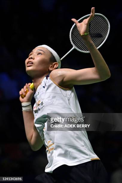 Tai Tzu Ying of Taiwan hits a return against Iris Wang of US during their womens singles qualifying match at the Indonesia Open badminton tournament...