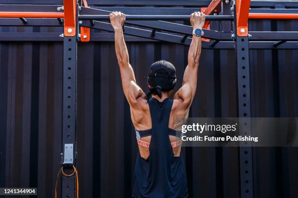 Person does pull-ups at a new modular CrossFit outdoor gym, Uzhhorod, Zakarpattia Region, western Ukraine. This photo cannot be distributed in the...