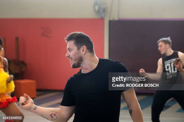 Members of the DHL Stormers Dancers practice their dance routines, at a church hall on June 16 in Cape Town. They will perform before the United...