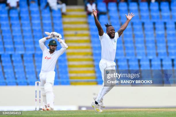 Kyle Mayers of West Indies celebrates the dismissal of Quazi Nurul Hasan Sohan of Bangladesh lbw during the 1st day of the 1st Test between...