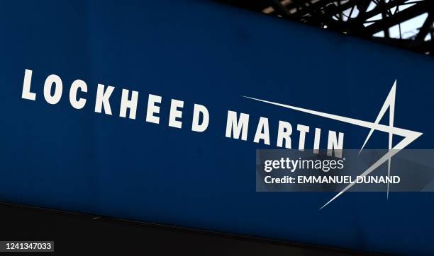 This photograph taken on June 13 shows the logo from US defence manufacturer Lockheed Martin on display at the Eurosatory international land and...