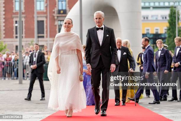 Norway's Princess Ingrid Alexandra accompanied by Prime Minister of Norway Jonas Gahr Stoere arrive at the government's party celebratation of her...