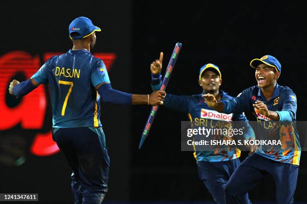 Sri Lanka's Captain Dasun Shanaka celebrates with teammates after Sri Lanka won by 26 runs during the second one-day international cricket match...
