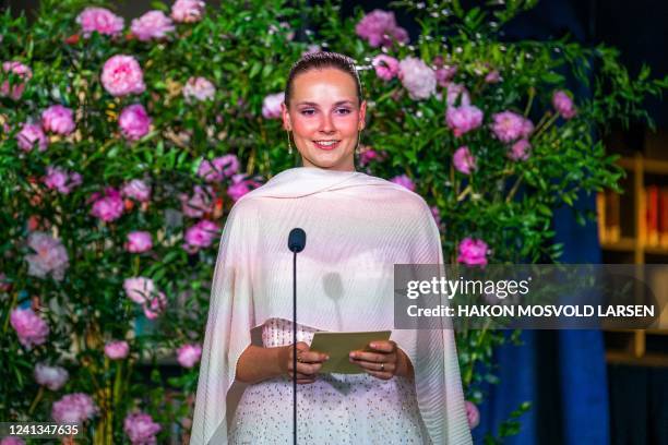 Norway's Princess Ingrid Alexandra gives a speech at the government's party celebratations of her 18th birthday at Deichman Bjoervika, Oslo's main...