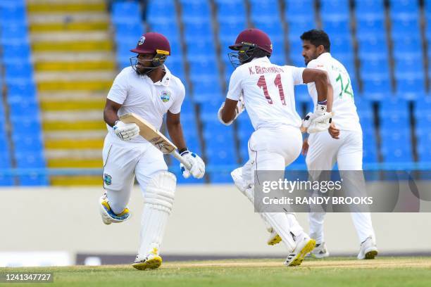 John Campbell and Kraigg Brathwaite of West Indies get runs off Syed Khaled Ahmed of Bangladesh during the 1st day of the 1st Test between Bangladesh...