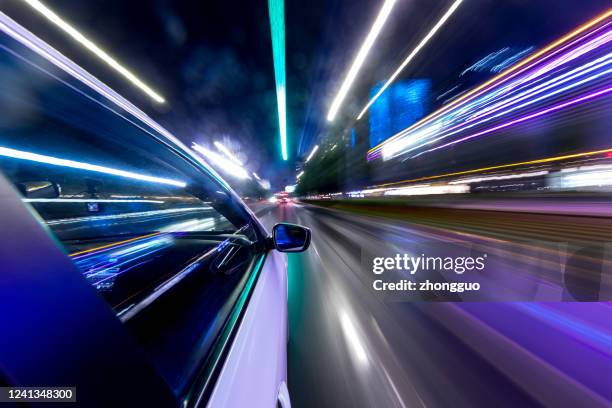 zusammenfassung hintergrund geschwindigkeit ampel loipen mit kreis bokeh - autoscheinwerfer stock-fotos und bilder