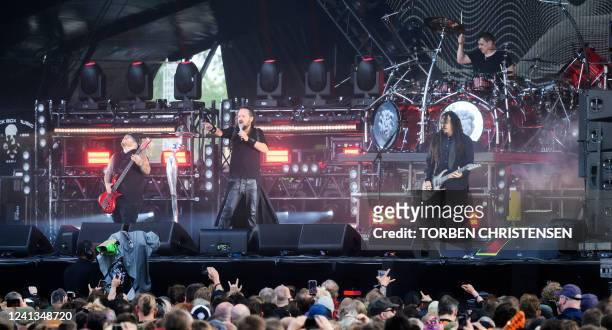 Singer Jonathan Davis and musician James "Munky" Shaffer of the band Korn perform on the Helviti stage at the Heavy Metal Rock Festival Copenhell in...
