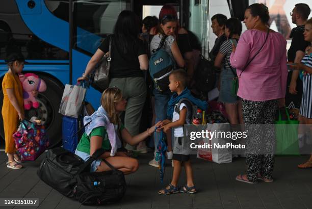 Travelers are waiting to board a Ukrainian bus to Kiev, at the bus station in Krakow. The Russian invasion is slowing down and refugees from Ukraine...