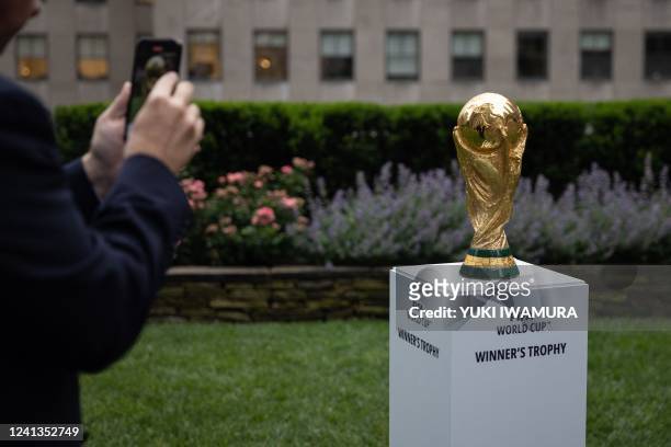 The FIFA World Cup trophy is displayed during an event in New York after an announcement related to the staging of the FIFA World Cup 2026, on June...