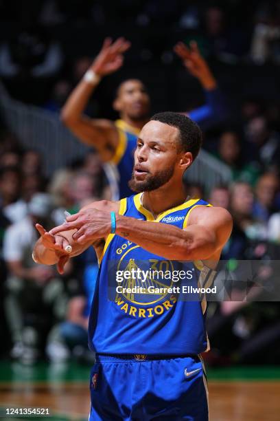 Stephen Curry of the Golden State Warriors celebrates a three point basket against the Boston Celtics during Game Six of the 2022 NBA Finals on June...