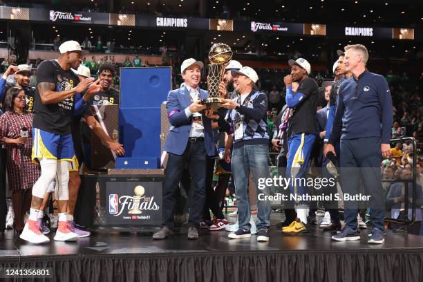 Owners, Joe Lacob and Peter Guber of the Golden State Warriors smile after Game Six of the 2022 NBA Finals on June 16, 2022 at TD Garden in Boston,...