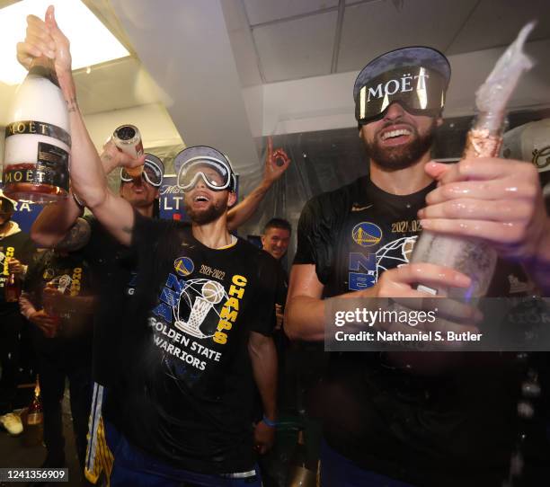 Stephen Curry and Klay Thompson of the Golden State Warriors celebrate after Game Six of the 2022 NBA Finals on June 16, 2022 at TD Garden in Boston,...