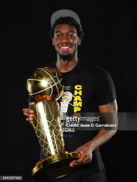 James Wiseman of the Golden State Warriors poses for a portrait with the Larry OBrien Trophy after winning Game Six of the 2022 NBA Finals against...