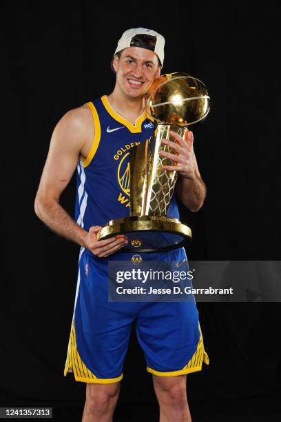 Nemanja Bjelica of the Golden State Warriors poses for a portrait with the Larry OBrien Trophy after winning Game Six of the 2022 NBA Finals against...