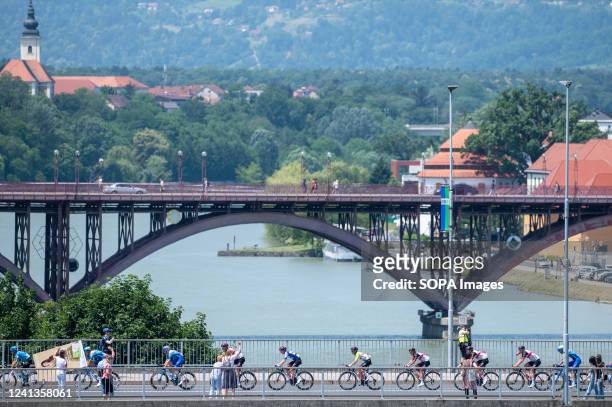 General view of the peloton competing at Titov bridge in Maribor during the 28th Tour of Slovenia, 2nd Stage, a 174,2km stage between Ptuj and...