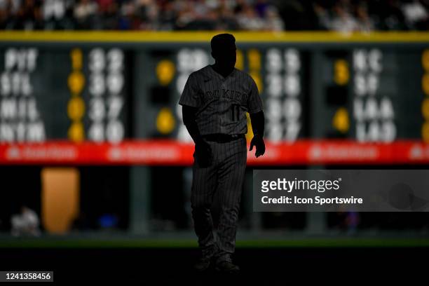 Colorado Rockies shortstop Jose Iglesias stands on the field during a game between the Cleveland Guardians and the Colorado Rockies at Coors Field on...
