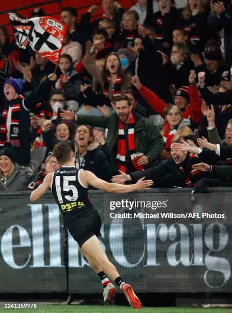 Jack Billings of the Saints celebrates with the crowd during the 2022 AFL Round 14 match between the St Kilda Saints and the Essendon Bombers at...