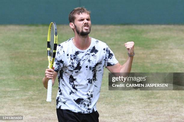 Germany's Oscar Otte reacts during his match against Russia's Karen Khachanov at the men's singles quarter final at the ATP 500 Halle Open tennis...