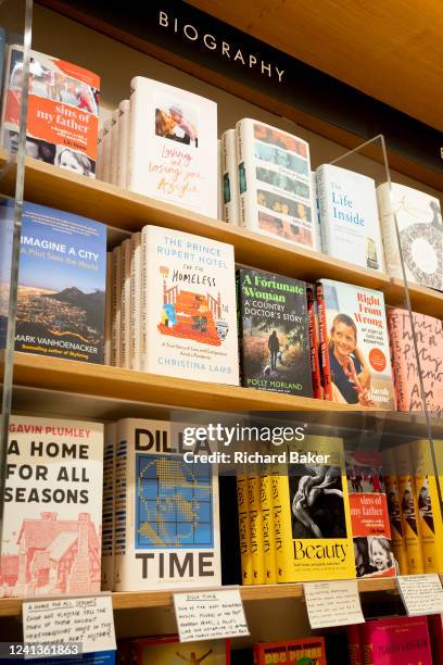 Published titles fill the bookshelves in the Piccadilly branch of Waterstones bookshop and in particular, the book entitled 'A Fortunate Woman: A...
