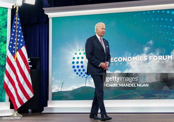 President Joe Biden arrives to address the Major Economies Forum on Energy and Climate from the South Court Auditorium of the Eisenhower Executive...