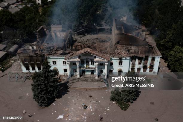 An aerial view shows the destroyed Community Art Center following a strike in the city of Lysychansk, in the eastern Ukrainian region of Donbas on...