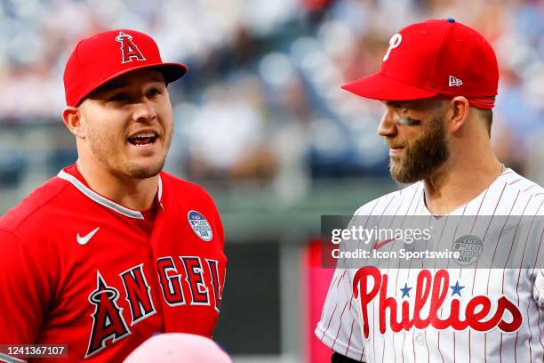 Los Angeles Angels center fielder Mike Trout and Philadelphia Phillies designated hitter Bryce Harper pose for photos on the field prior to the Major...