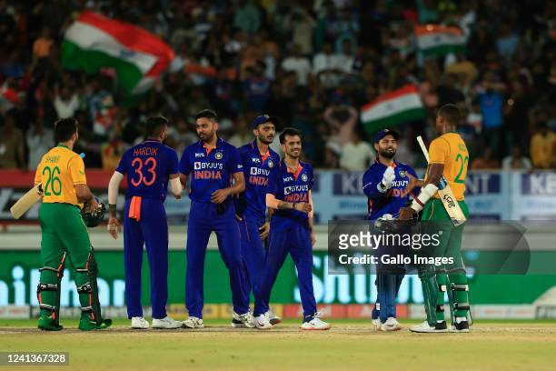 Indian players celebrate the victory during the 4th T20 International match between India and South Africa at Saurashtra Cricket Association Stadium...