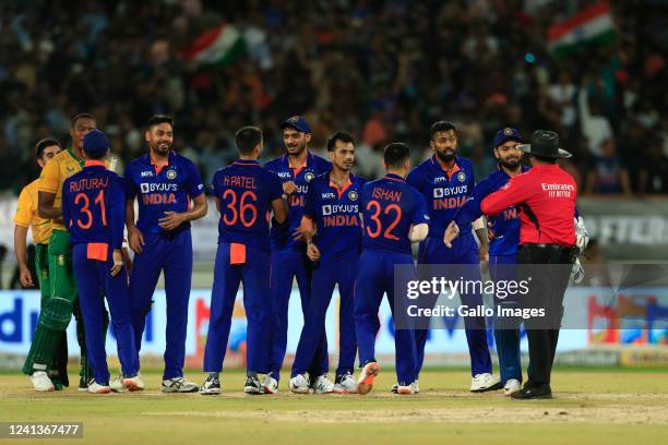 Indian players celebrate the victory during the 4th T20 International match between India and South Africa at Saurashtra Cricket Association Stadium...