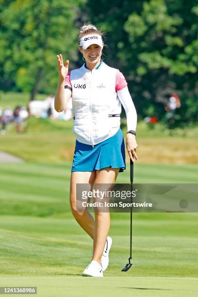Golfer Nelly Korda talks to Brooke Henderson as she gets ready to putt on the second hole on June 17, 2022 during the Meijer LPGA Classic For Simply...
