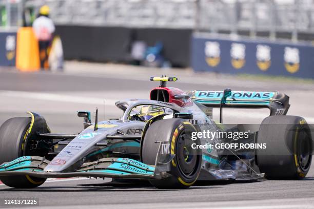 Mercedes' British driver Lewis Hamilton takes a turn during practice ahead of the F1 Grand Prix of Canada at Circuit Gilles Villeneuve on June 17,...