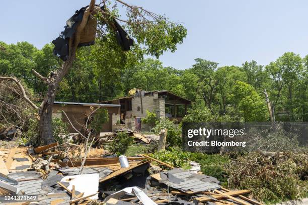 Home damaged following a tornado in Manhattan, Kansas, US, on Friday, June 17, 2022. Cool and stormy weather at the corners of the US are helping...