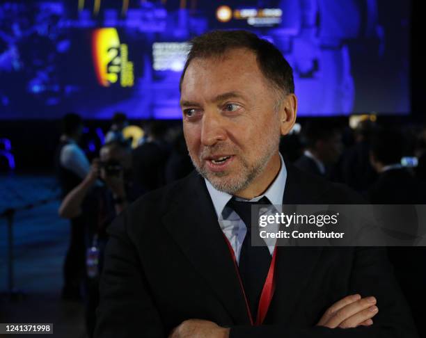 Russian billionaire and businessman Oleg Deripaska smiles at the plenary session during the Saint Petersburg Economic Forum SPIEF 2022, on June 17 in...