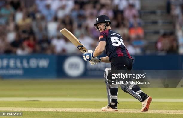 Jimmy Neesham of Northamptonshire Steelbacks reverse sweeps during the Vitality T20 Blast match between Northamptonshire Steelbacks and Lancashire...