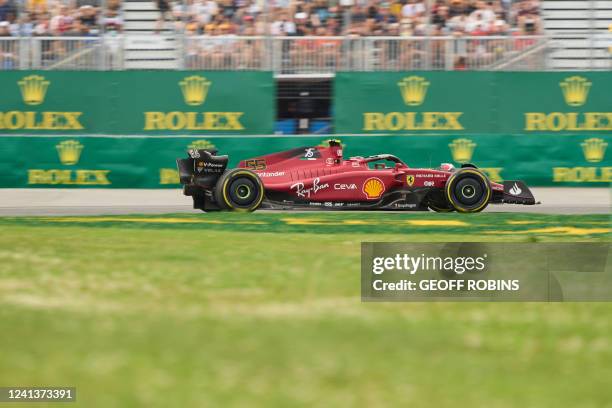 Ferrari's Spanish driver Carlos Sainz Jr takes a turn during practice ahead of the F1 Grand Prix of Canada at Circuit Gilles Villeneuve on June 17,...