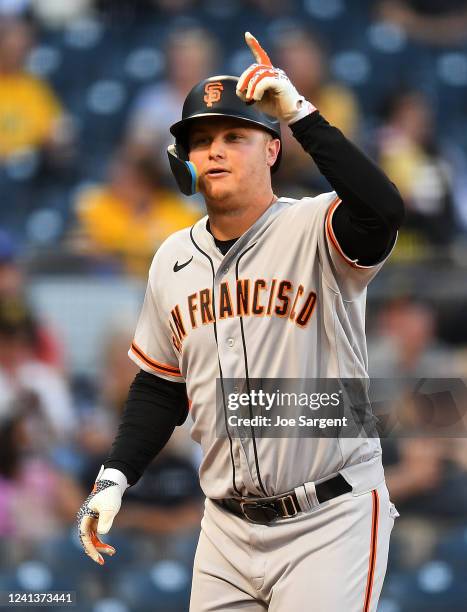Joc Pederson of the San Francisco Giants celebrates his solo home run during the fourth inning against the Pittsburgh Pirates at PNC Park on June 17,...