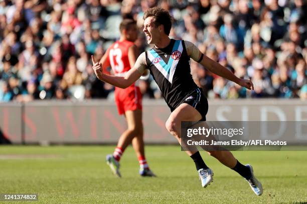 Zak Butters of the Power celebrates a goal during the 2022 AFL Round 14 match between the Port Adelaide Power and the Sydney Swans at the Adelaide...