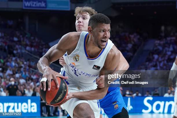 Real Madrid Baloncesto's Edy Tavares and FC Barcelona's Rokas Jokubaitis during Liga Endesa ACB 3rd Final match. June 17 Madrid, Spain.