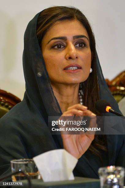 Pakistan's Minister of State for Foreign Affairs, Hina Rabbani Khar gestures as she speaks during a media briefing in Islamabad on June 18 on her...