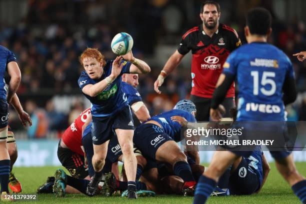 Finlay Christie of the Blues clears the ball forward during the Super Rugby Pacific final between the Blues and the Crusaders at Eden Park in...